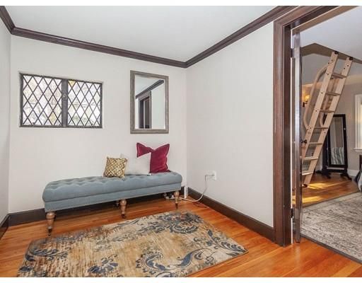 a bedroom with furniture and a bed