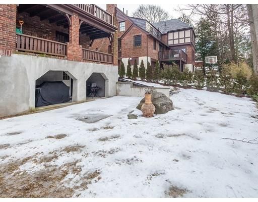 a view of a house with a snow in the yard
