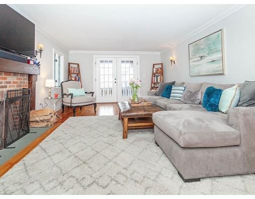 29 Gate House Road Newton, MA 02467 - Photo 3 of 29 a living room with furniture and a flat screen tv