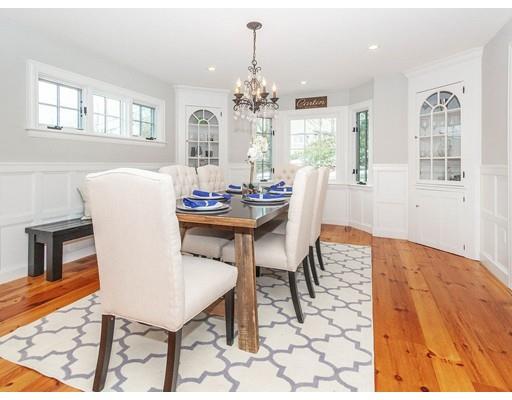 29 Gate House Road Newton, MA 02467 - Photo 5 of 29 a dining room with furniture a chandelier and wooden floor