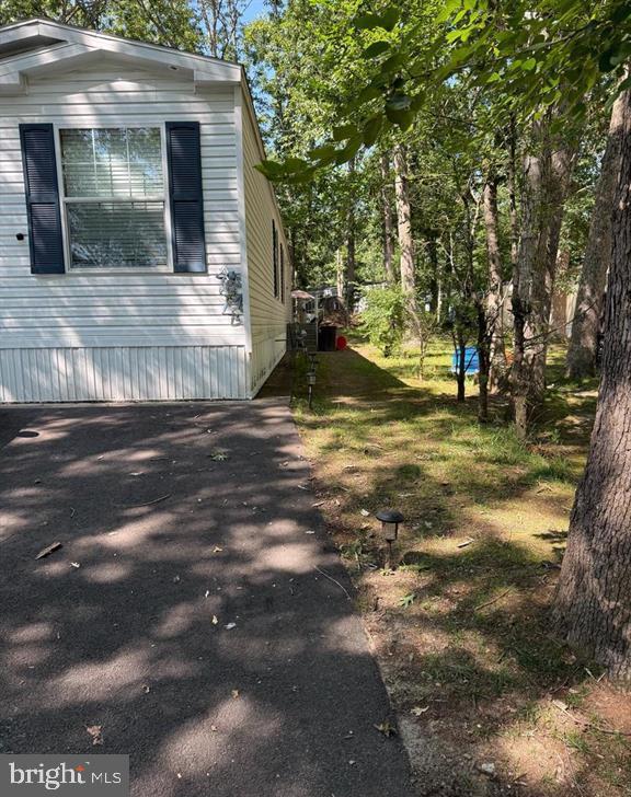 2110 Mays Landing Road, Unit 73 Millville, NJ 08332 - Photo 2 of 11 a view of backyard of the house