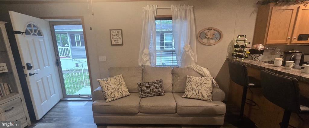 2110 Mays Landing Road, Unit 73 Millville, NJ 08332 - Photo 4 of 11 a living room with furniture and a window