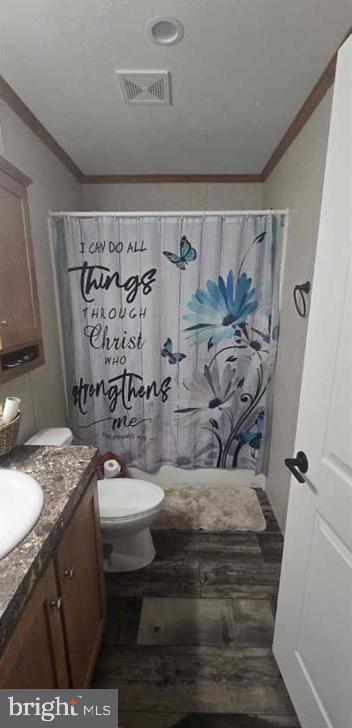 2110 Mays Landing Road, Unit 73 Millville, NJ 08332 - Photo 6 of 11 a bathroom with a sink and a mirror