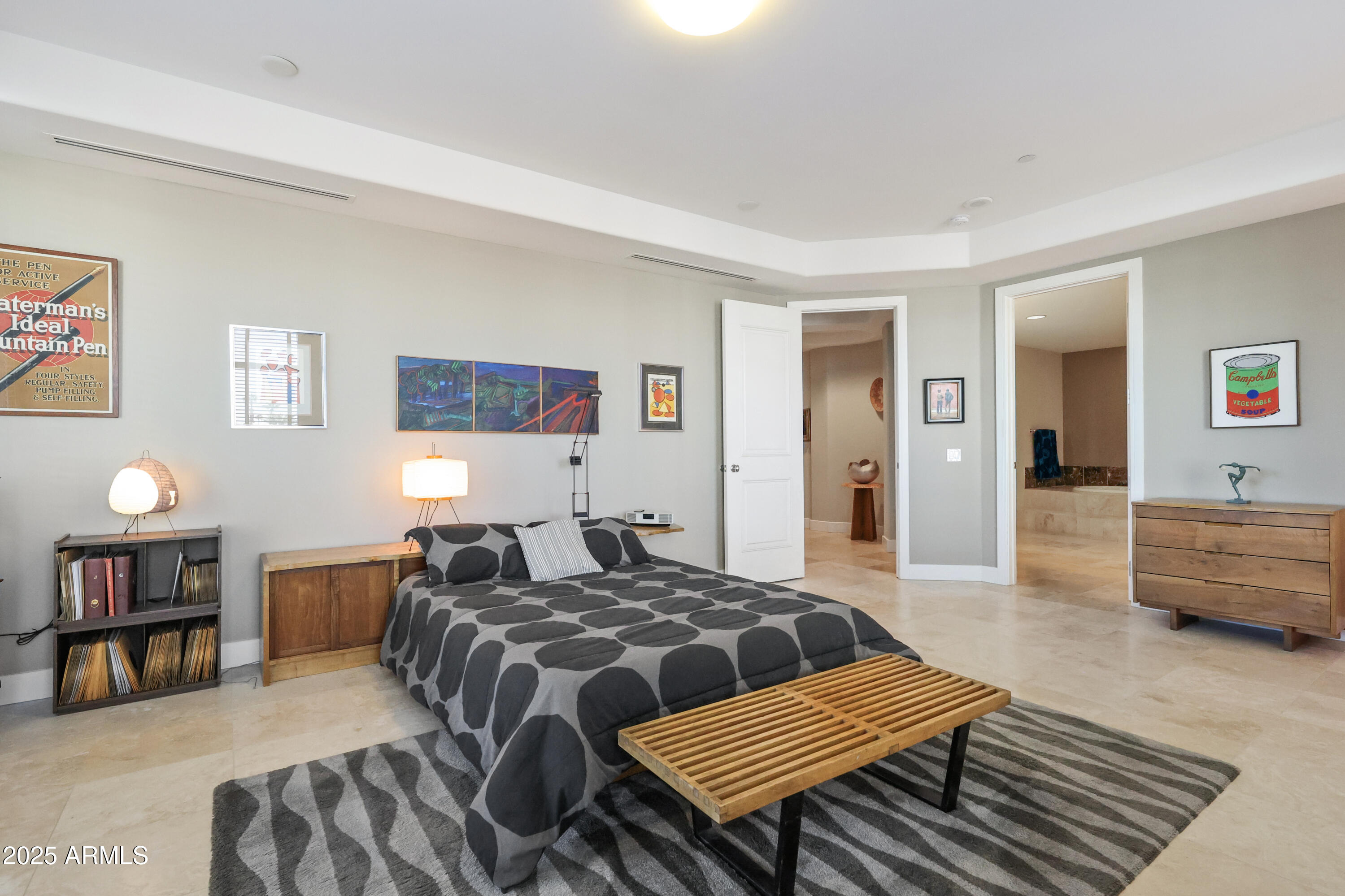 2211 East Camelback Road, Unit 201 Phoenix, AZ 85016 - Photo 17 of 42 a bedroom with furniture and wooden floor