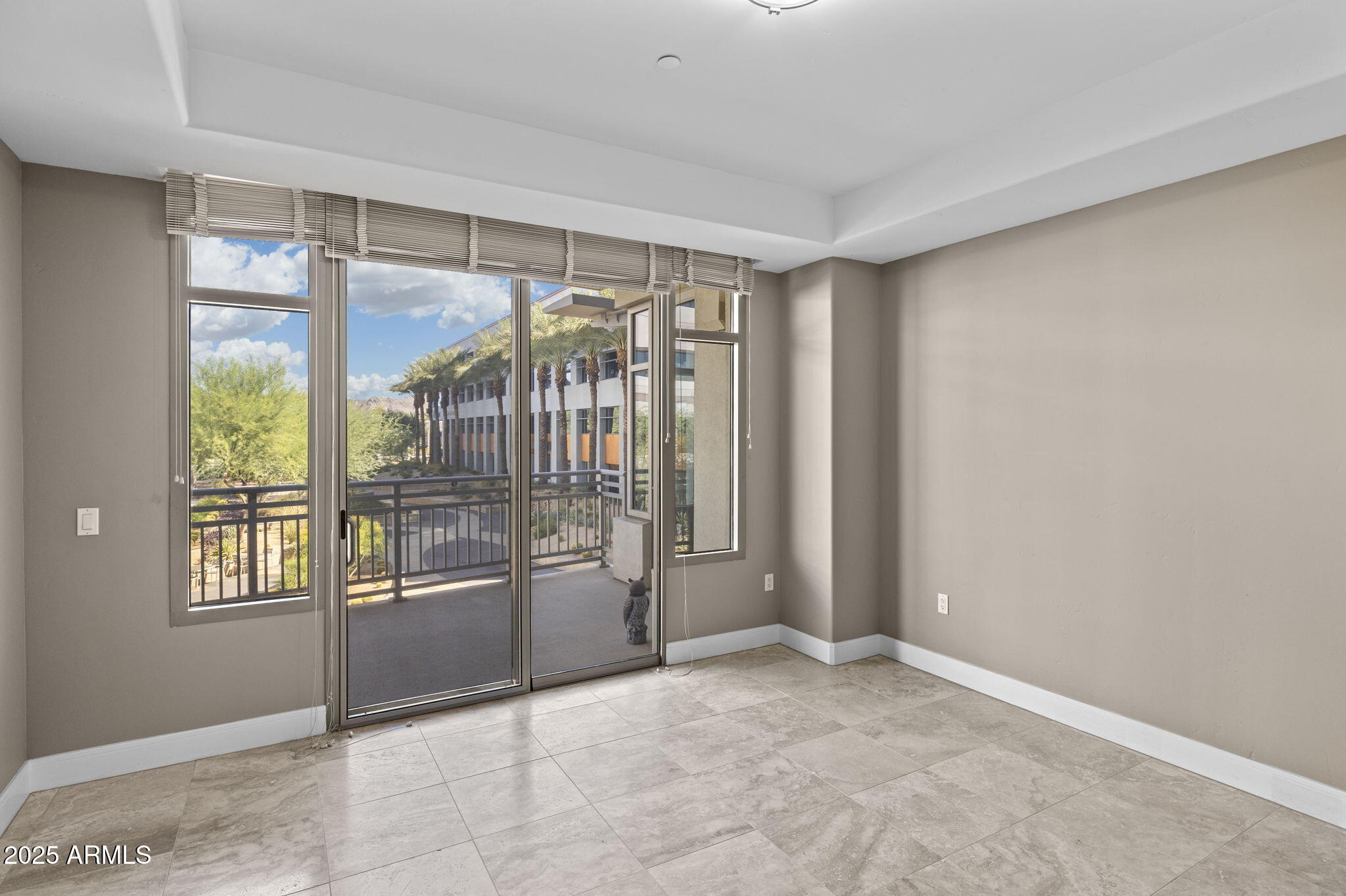 2211 East Camelback Road, Unit 201 Phoenix, AZ 85016 - Photo 22 of 42 a view of an empty room and window