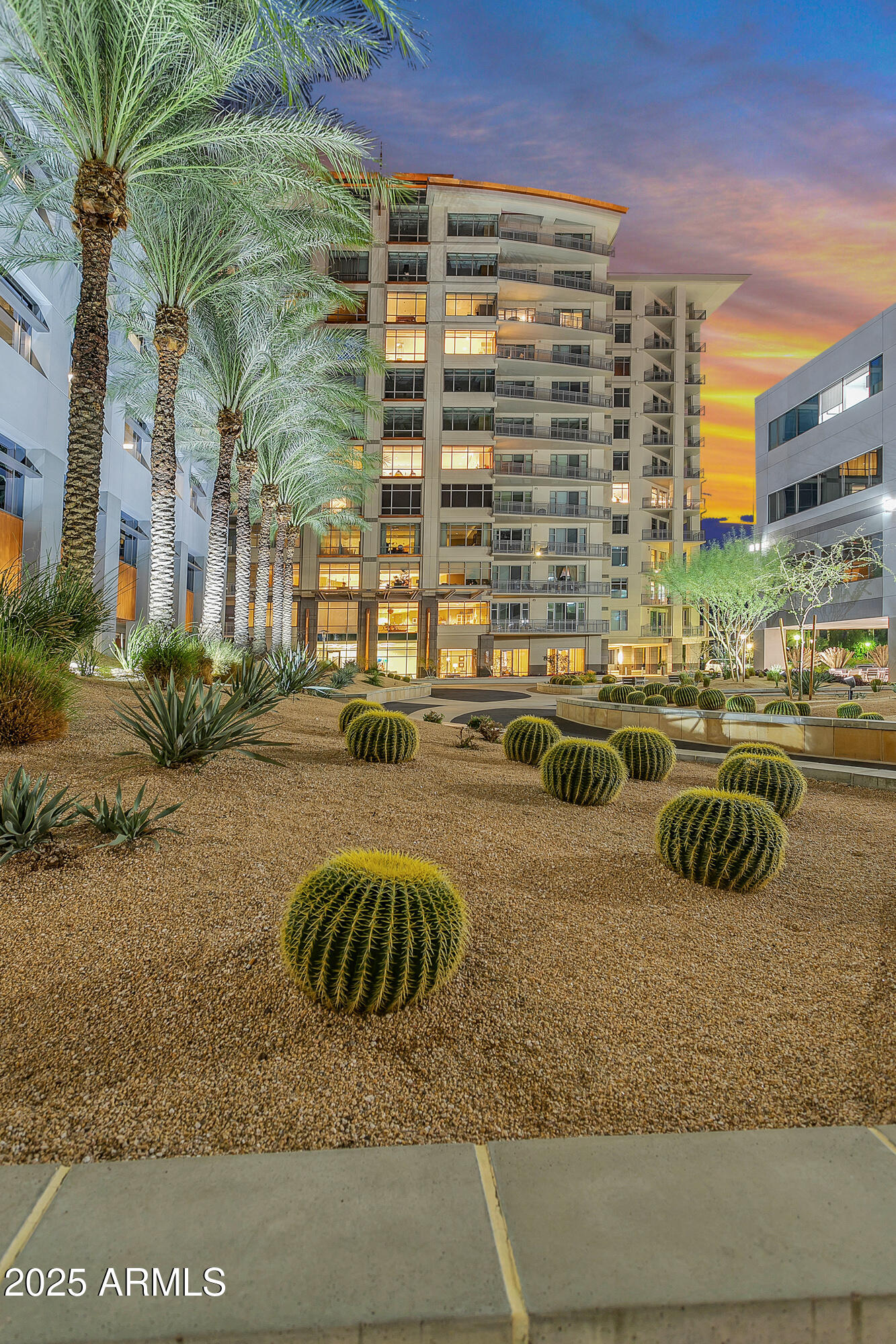 2211 East Camelback Road, Unit 201 Phoenix, AZ 85016 - Photo 41 of 42 a view of a swimming pool with a patio