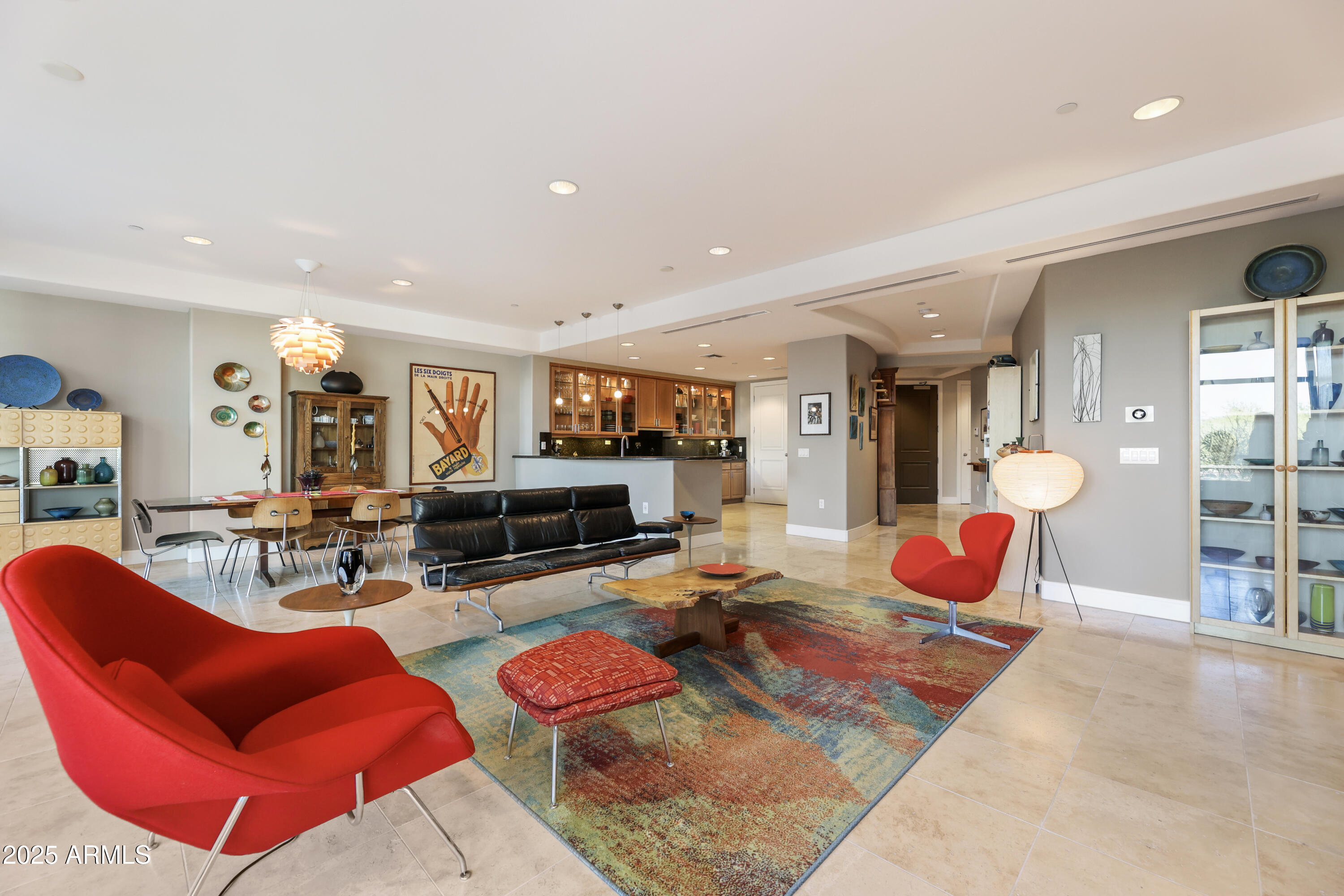 2211 East Camelback Road, Unit 201 Phoenix, AZ 85016 - Photo 5 of 42 a living room filled with furniture and rug