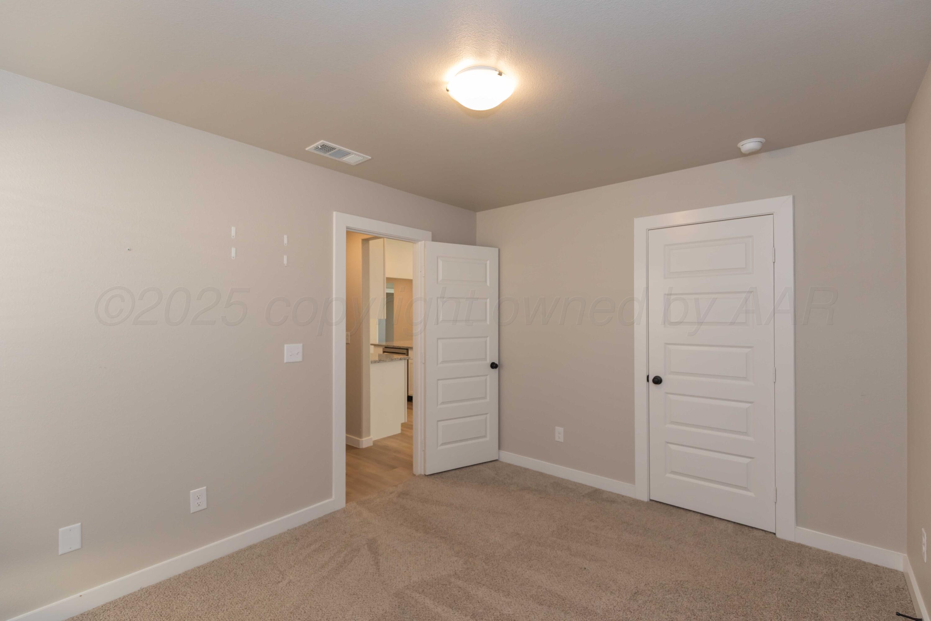 1801 Moon River Road Amarillo, TX 79118 - Photo 20 of 43 wooden floor and an entryway in a room