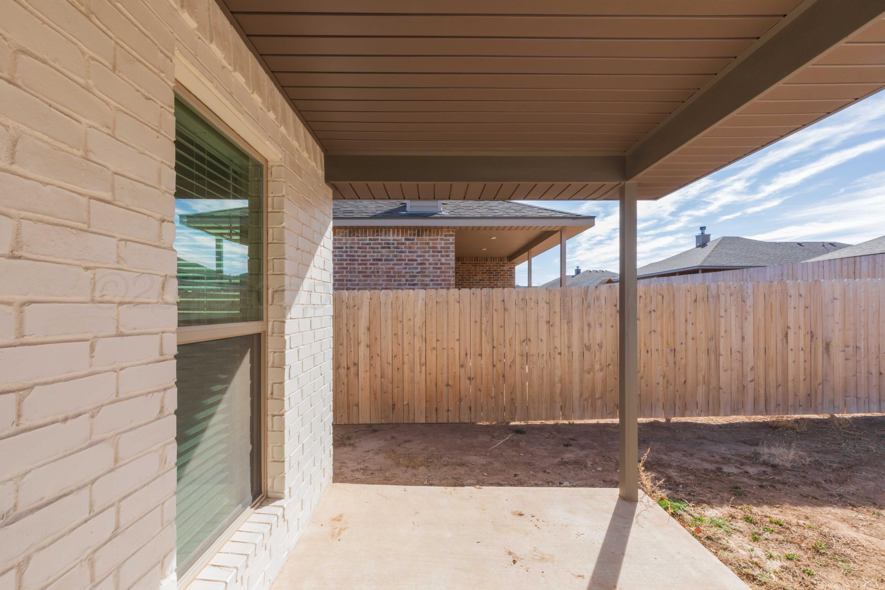 1801 Moon River Road Amarillo, TX 79118 - Photo 41 of 43 a backyard of a house
