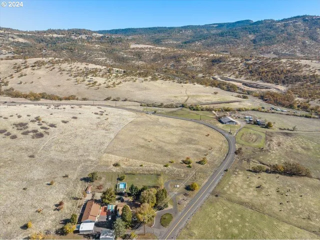 a view of a bathroom with a sink and mirror