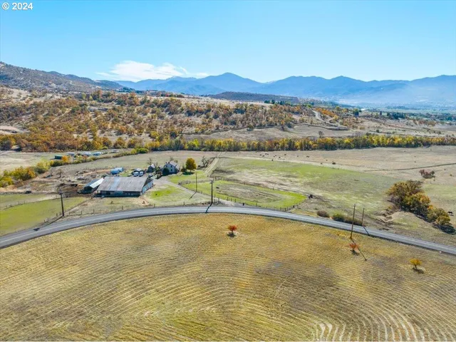a view of an ocean and city