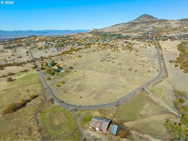 a view of an ocean and a mountain