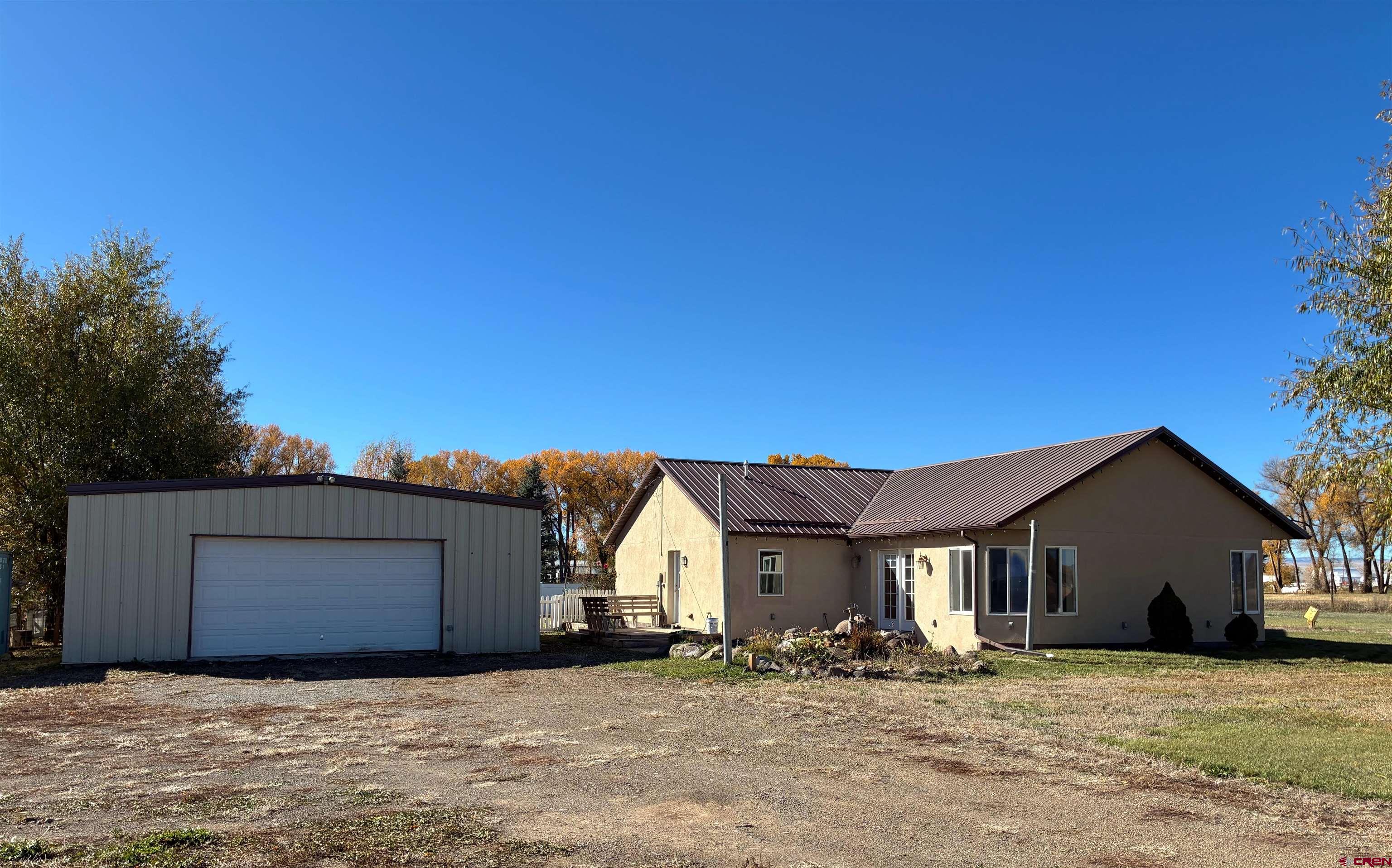 a wooden house with a outdoor space