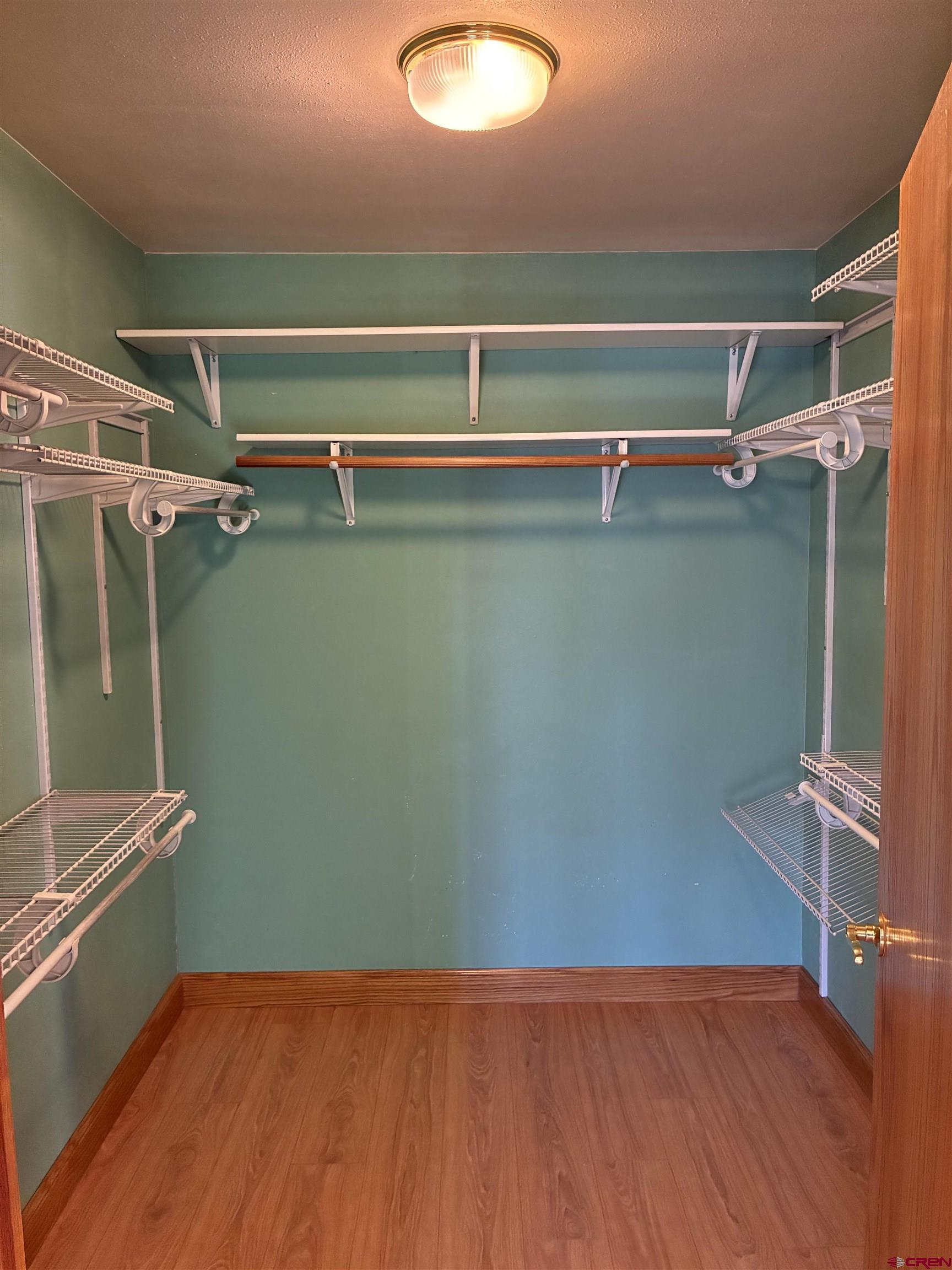 15334 County Rd T.5 La Jara, CO 81140 - Photo 20 of 28 a view of a room with wooden floor and windows