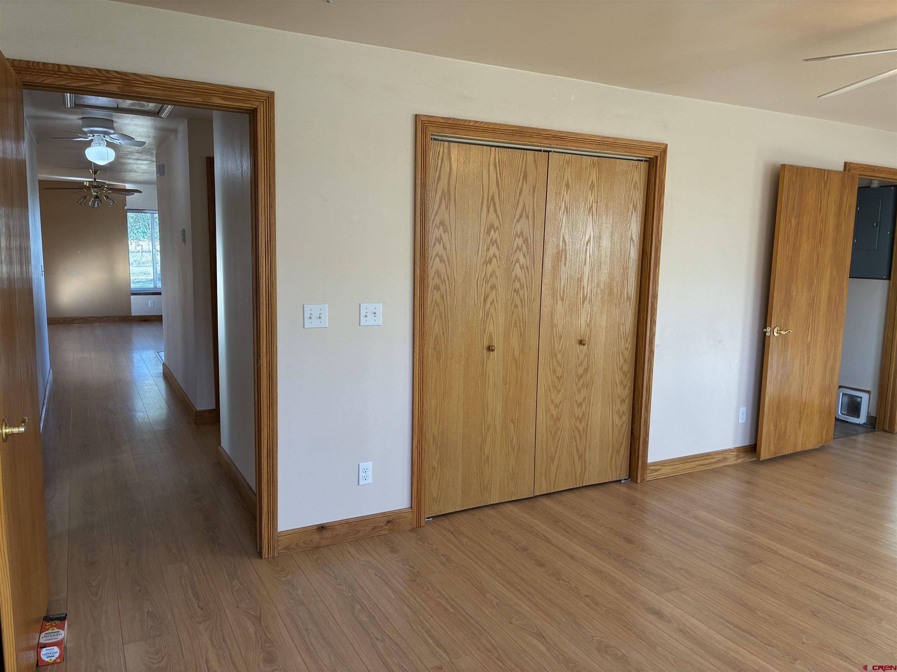 15334 County Rd T.5 La Jara, CO 81140 - Photo 26 of 28 a view of a hallway with wooden floor