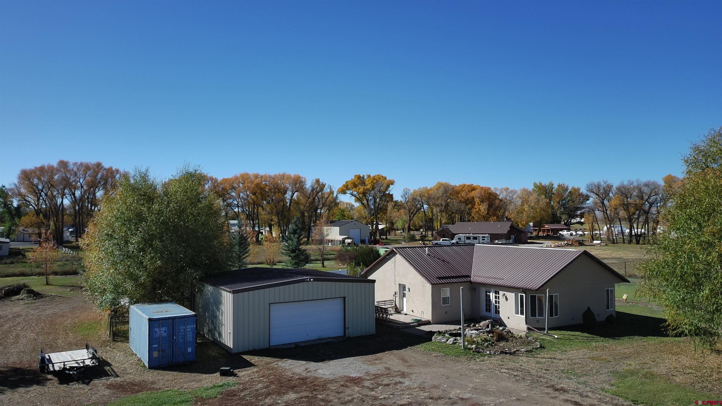 15334 County Rd T.5 La Jara, CO 81140 - Photo 5 of 28 a view of house with outdoor space and garden
