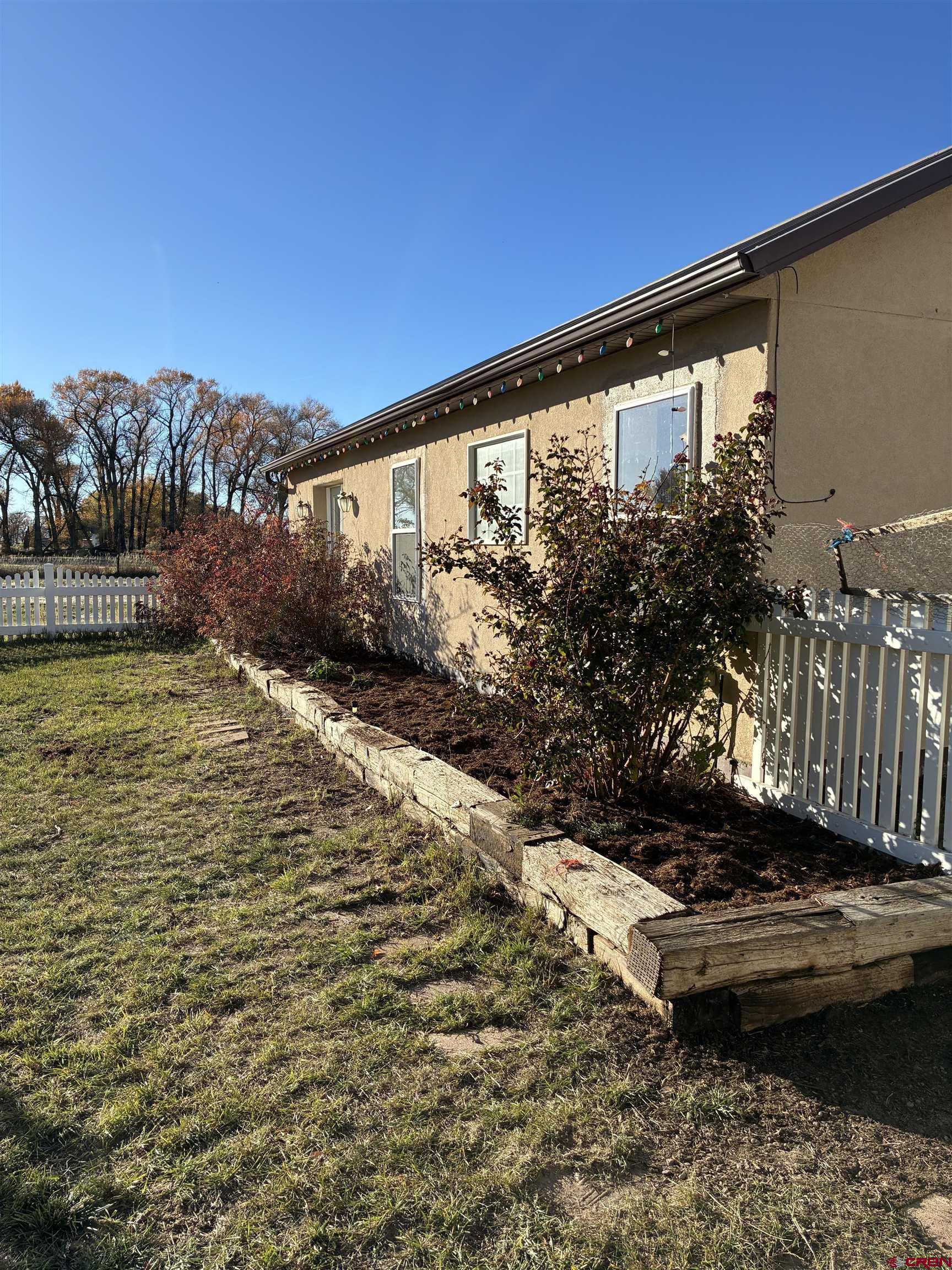 15334 County Rd T.5 La Jara, CO 81140 - Photo 9 of 28 a view of a swimming pool with a yard