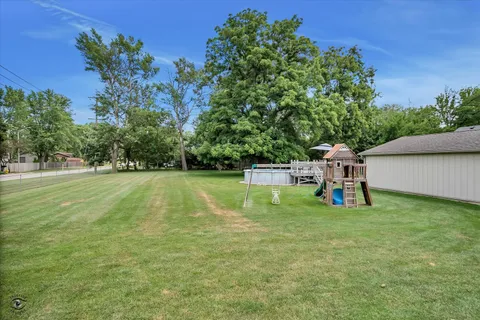 a view of a garden with a slide