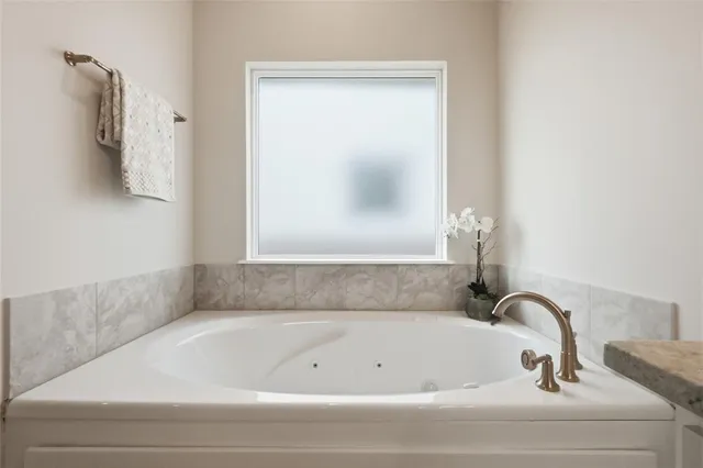 a bathroom with a bathtub