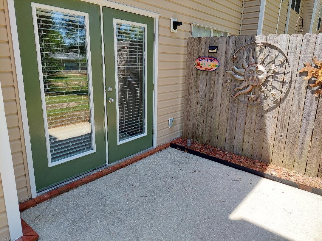 1517 Regency Road, Unit 34 Gulf Shores, AL 36542 - Photo 4 of 25 Back Patio