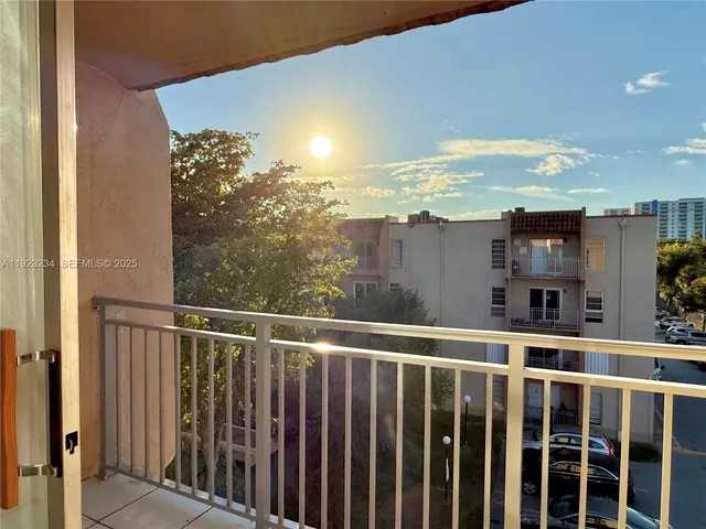 a view of a building from a balcony