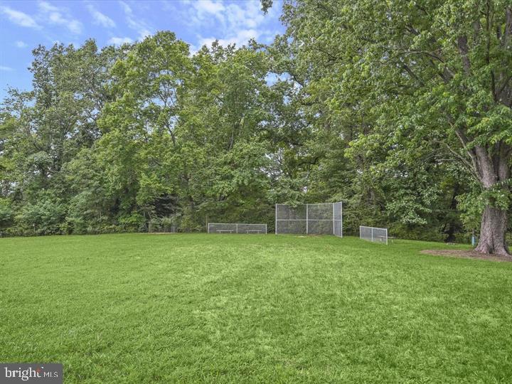 1446 Ridgeway Arnold, MD 21012 - Photo 34 of 41 a view of a grassy field with trees in the background