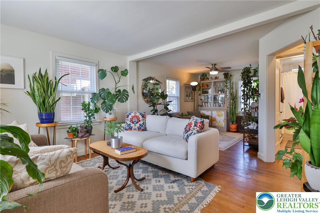 851 Media Street Bethlehem, PA 18017 - Photo 3 of 22 a living room with furniture and a potted plant