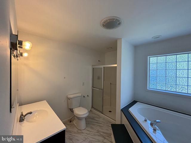 788 Paulsboro Road Swedesboro, NJ 08085 - Photo 13 of 15 a bathroom with a toilet a sink and bathtub