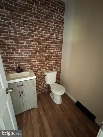 a bathroom with a toilet and a sink