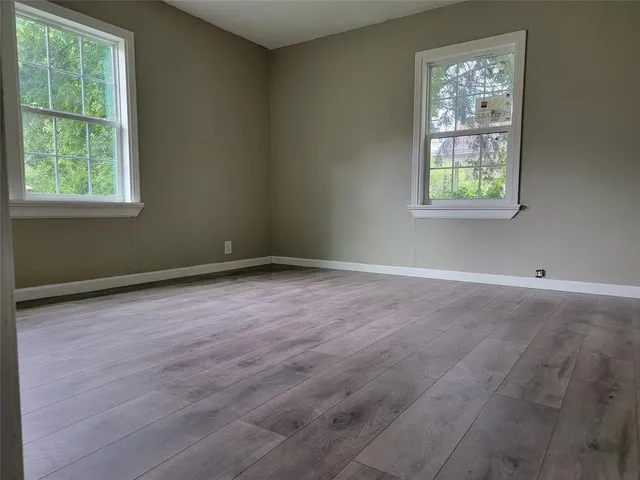 an empty room with windows