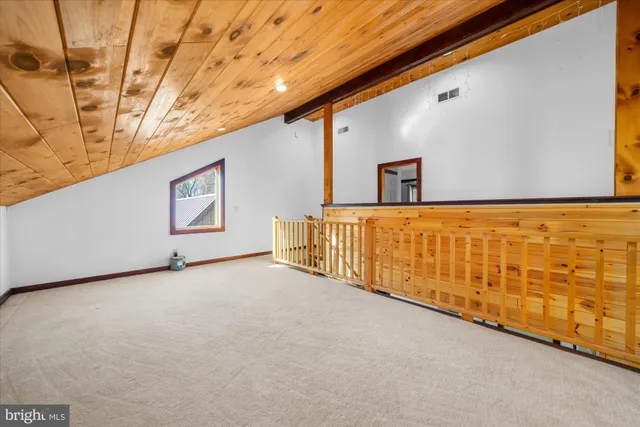 a bathroom with a granite countertop sink mirror and double