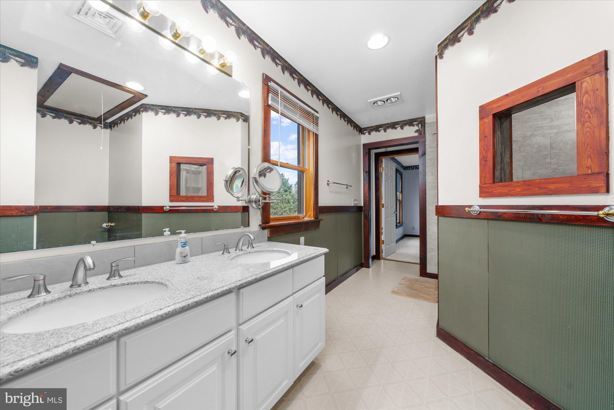 28 Highview Lane Mertztown, PA 19539 - Photo 29 of 57 a bathroom with a granite countertop sink mirror and double