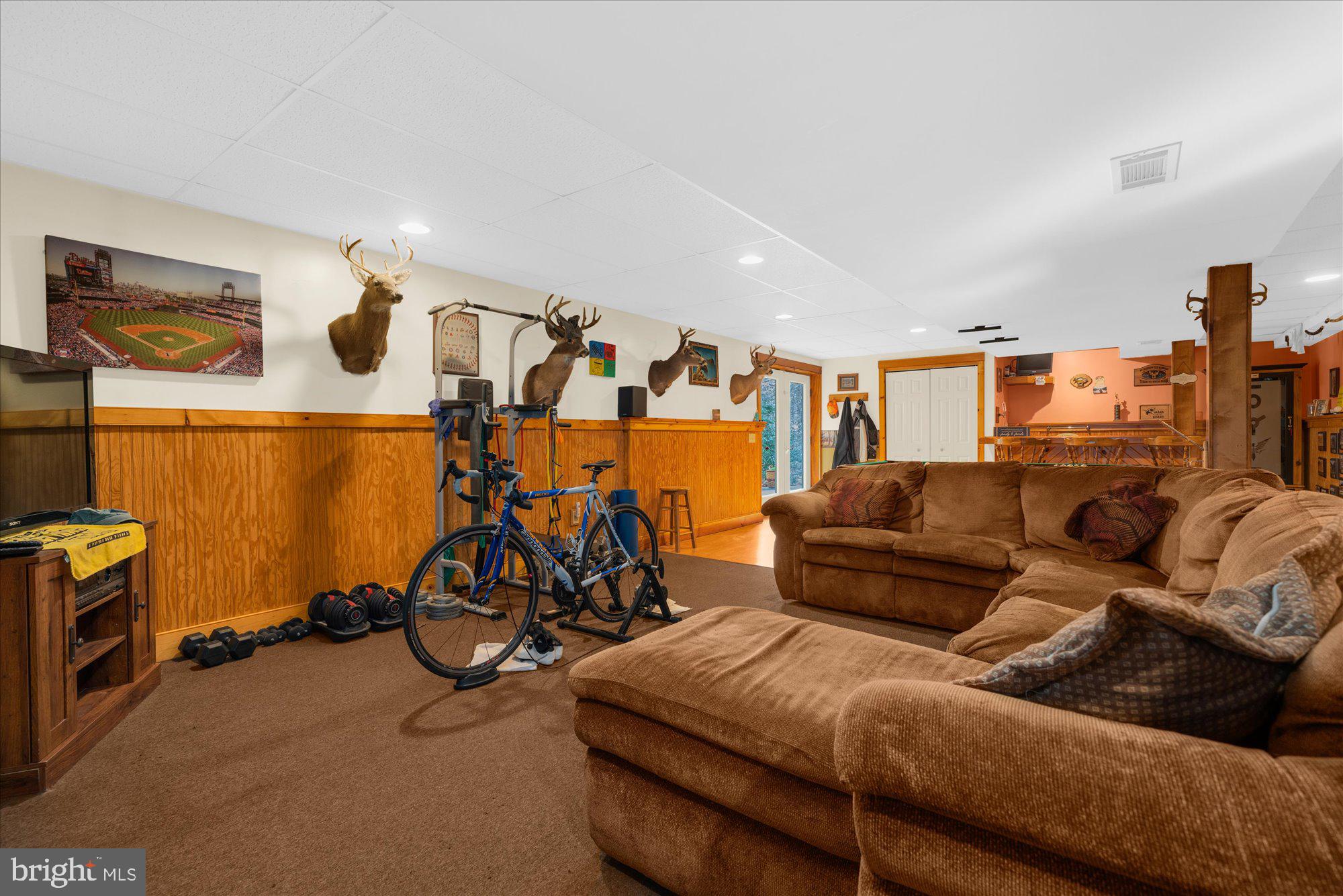 28 Highview Lane Mertztown, PA 19539 - Photo 39 of 57 a living room with furniture and gym equipment