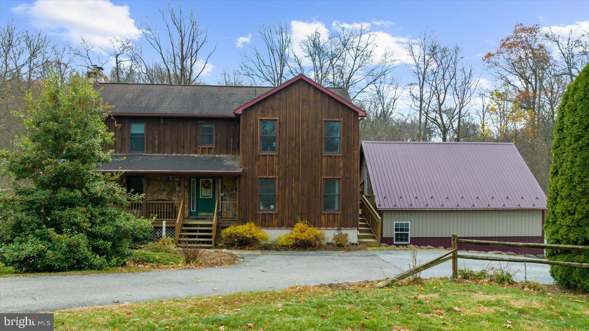 28 Highview Lane Mertztown, PA 19539 - Photo 43 of 57 a front view of a house with garden