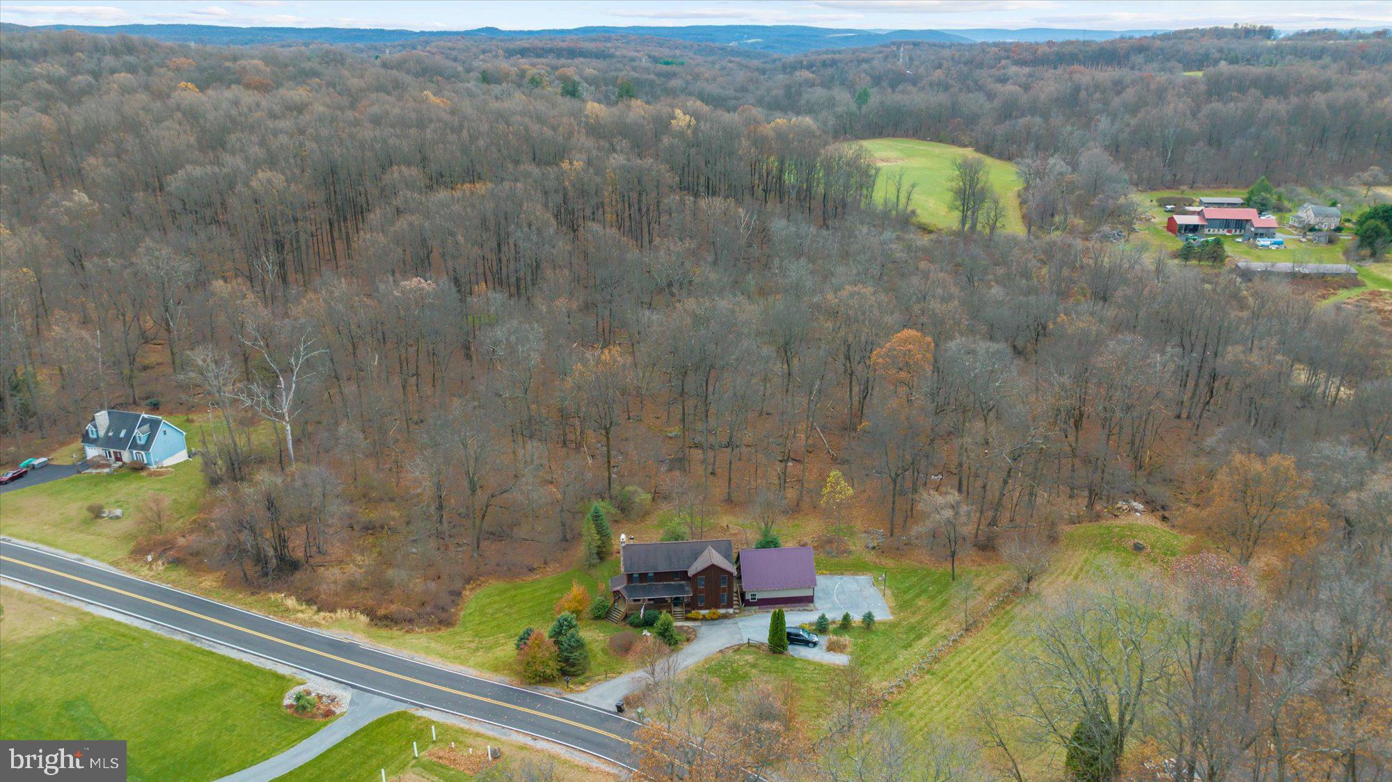 28 Highview Lane Mertztown, PA 19539 - Photo 55 of 57 a bathroom with a sink and mirror