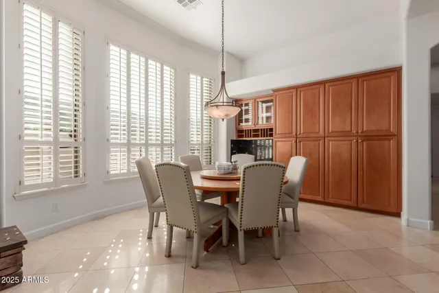 a bedroom with a bed window and couch