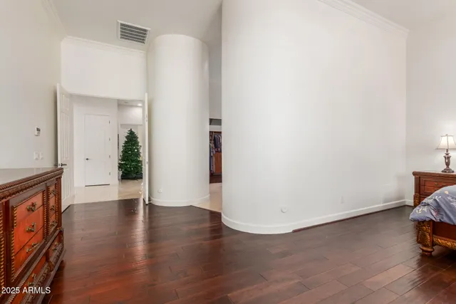 a bathroom with a granite countertop sink a toilet a mirror and shower