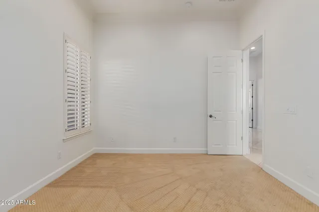 a view of a livingroom with furniture and a flat screen tv