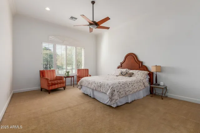 a view of an empty room with a cabinet and a flat screen tv