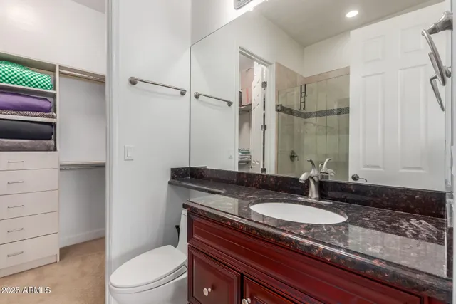 a bed room with a bed and a window