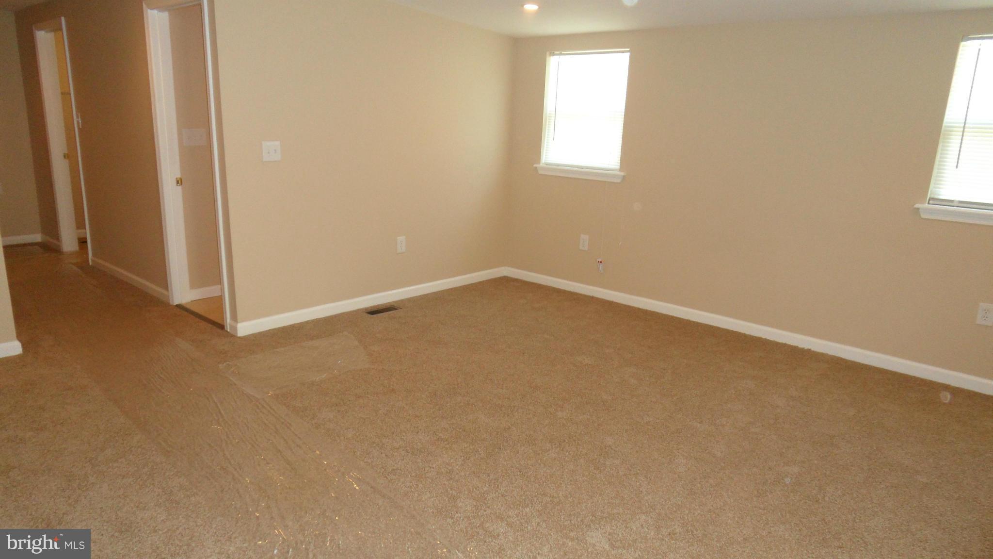 3604 Florida Road Baltimore, MD 21244 - Photo 14 of 28 an empty room with windows