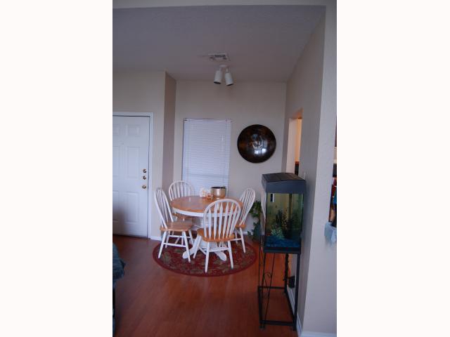 2804 Rio Grande Street, Unit 307 Austin, TX 78705 - Photo 13 of 14 Dining room featuring dark wood-type flooring and baseboards