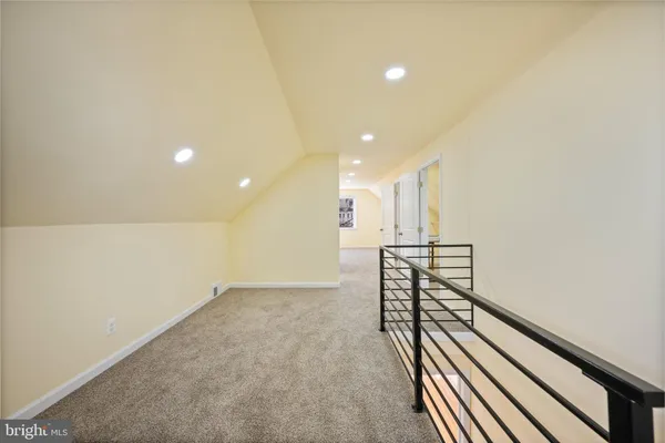 a view of hallway with stairs