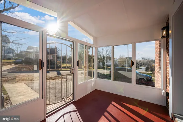 a view of a large window with wooden floor