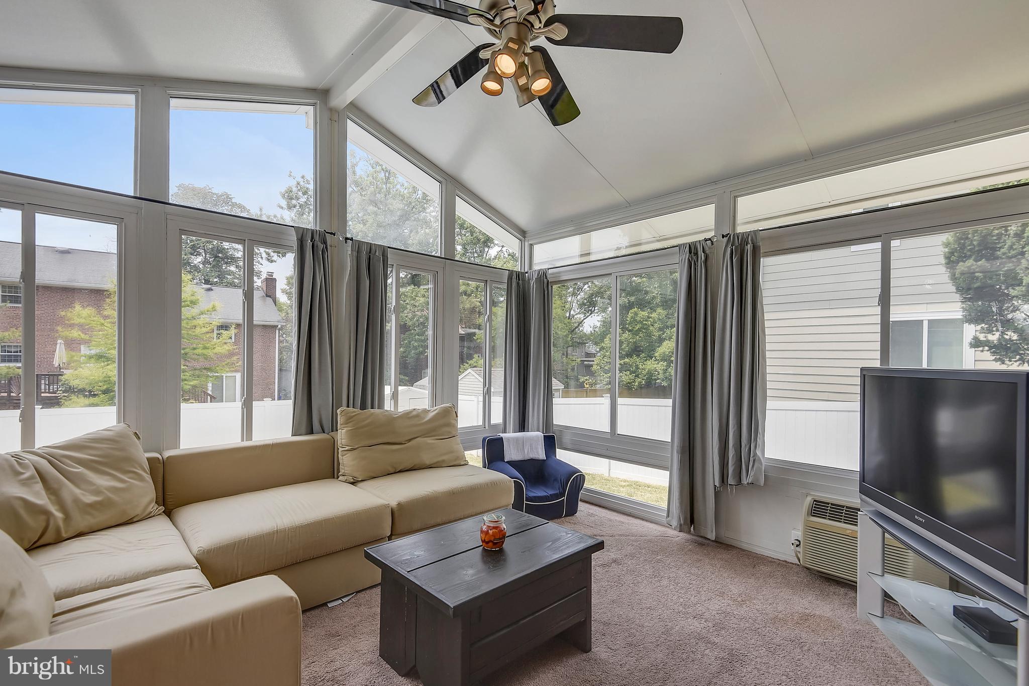 10000 Belhaven Road Bethesda, MD 20817 - Photo 11 of 30 SUNROOM OVERLOOKS THE POOL
