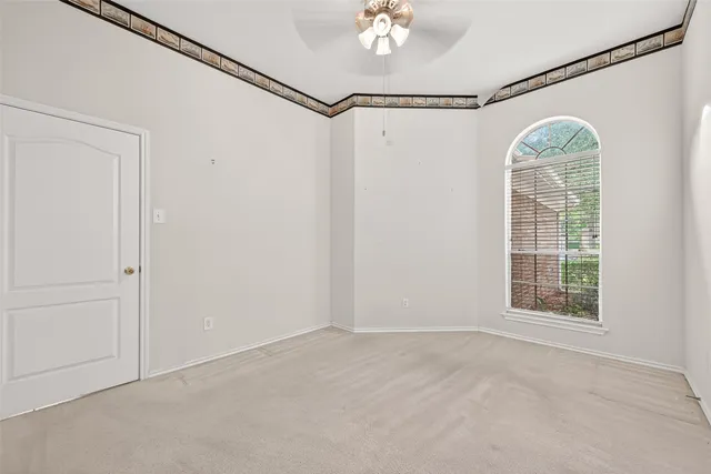 a view of a window in an empty room