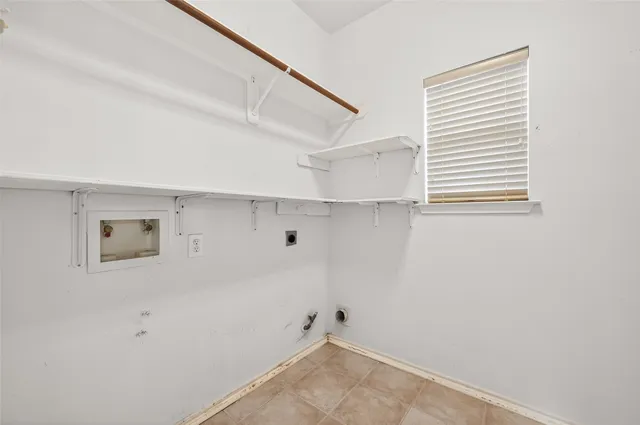 a view of a room that has a window in it