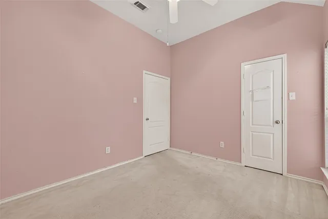 an empty room with closet