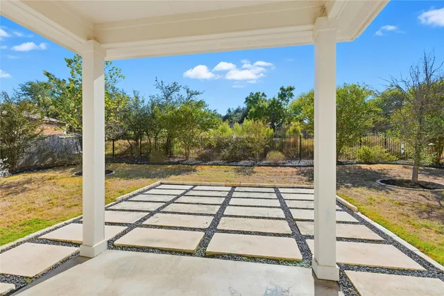 a bathroom with a toilet and shower