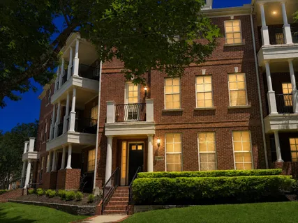 a front view of a multi story residential apartment building